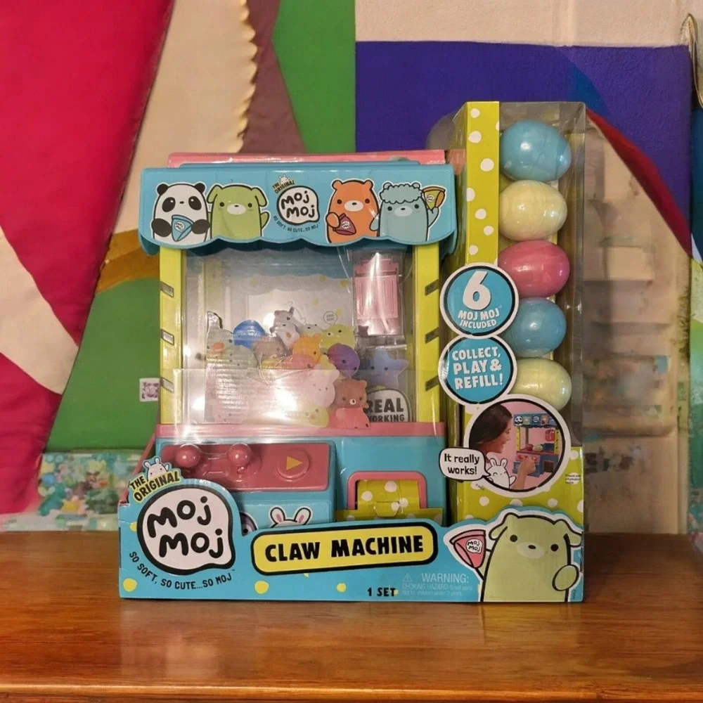 The Original Moj Moj Claw Machine Playset with 6 Mystery Eggs Pastel Arcade Toy